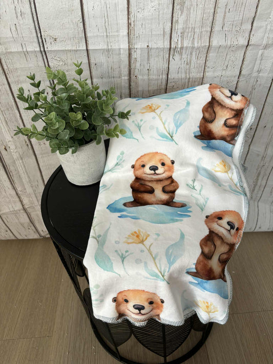 Couverture en squish loutre des mers